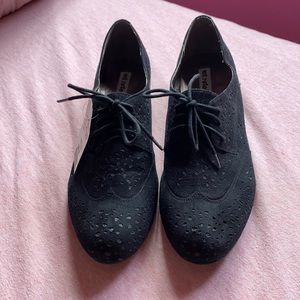Not Rated. NWT Size 11 Wing Tip Black Faux Suede With Shimmery Cut Outs.
